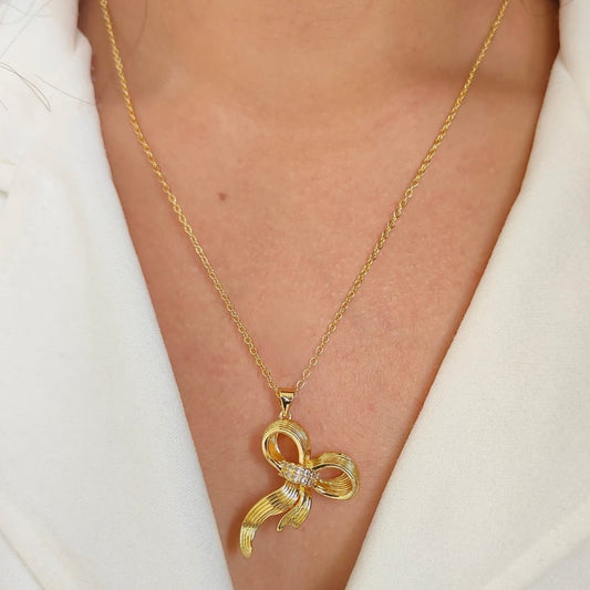 STATEMENT BOW NECKLACE