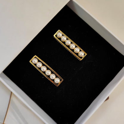 PEARL LINE STATEMENT EARRING 173